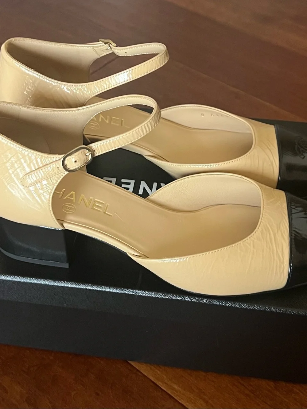 CHANEL Beige and Black Cap-Toe Slingback Heels
